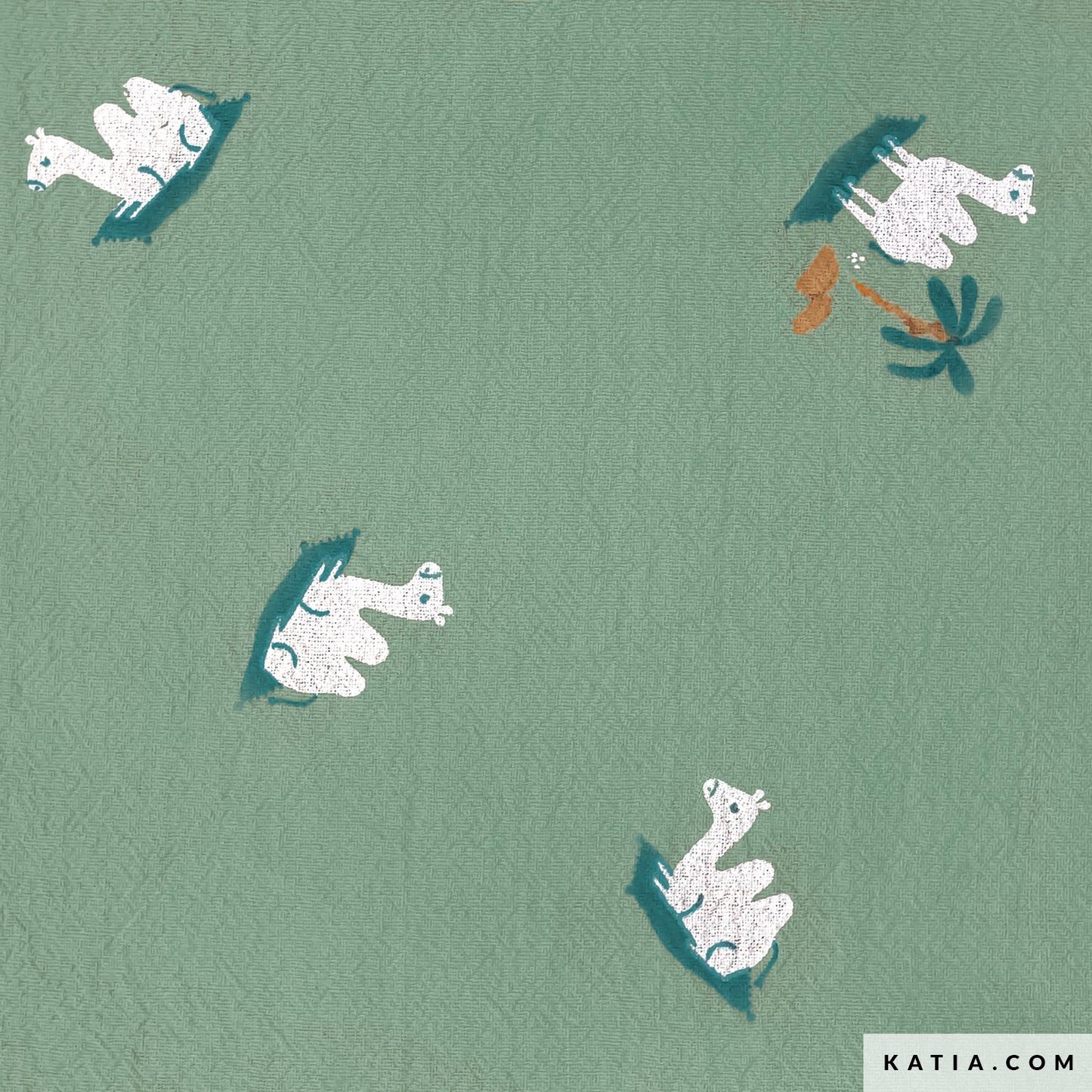 Green cotton fabric with camels for sewing children's clothing.