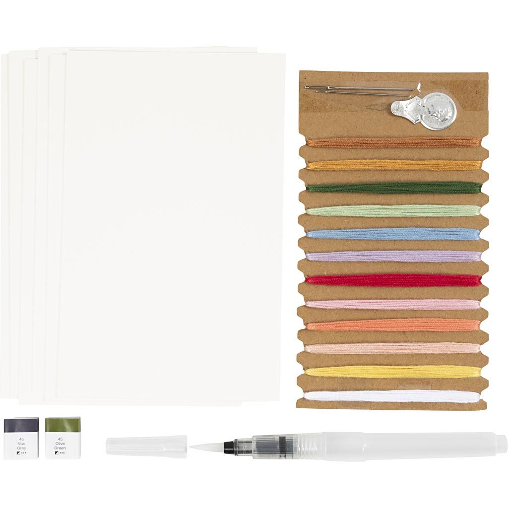 Set of colorful ribbons with a pen and small containers on a white background