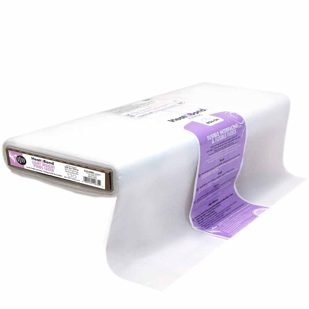 Roll of white heat and bond fusible interfacing for sewing and crafting.