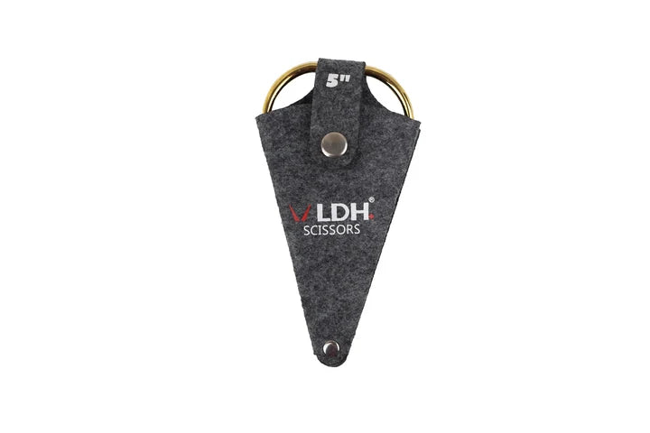 Gray triangular sheath with 'LDH Scissors' branding on a white background hold 5" dragon imperial crafting scissors.