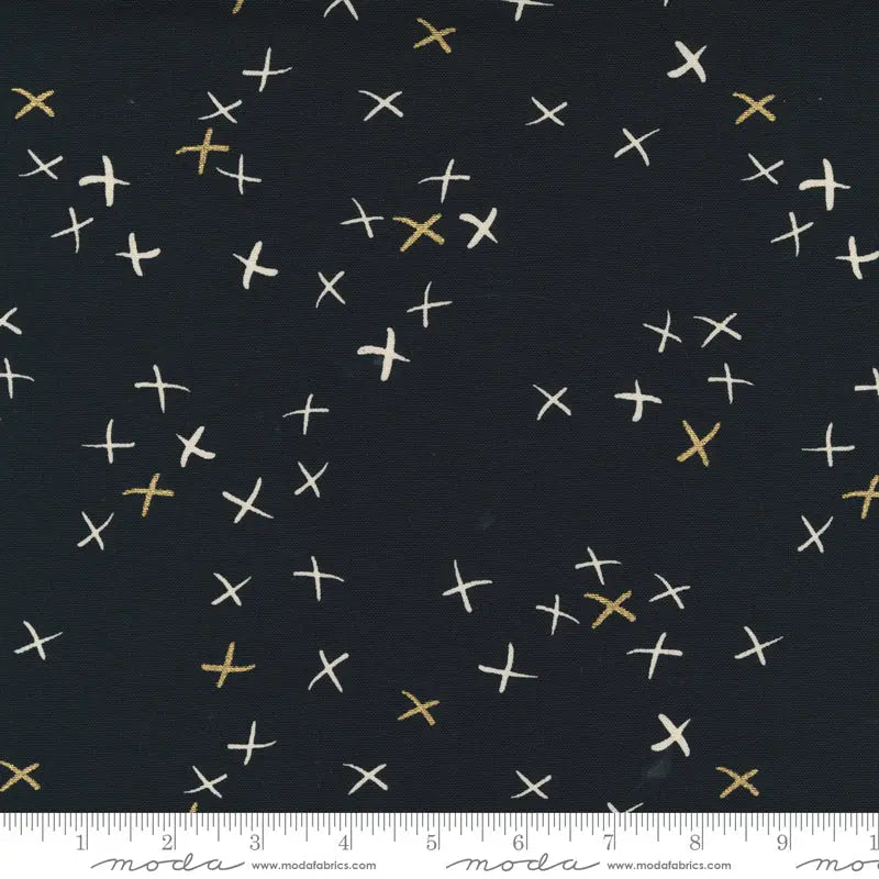 Fabric with a black background and white and metallic gold cross illustrations. 100% Cotton canvas for sewing and crafting.