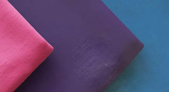 Selection of solid quilting fabrics.