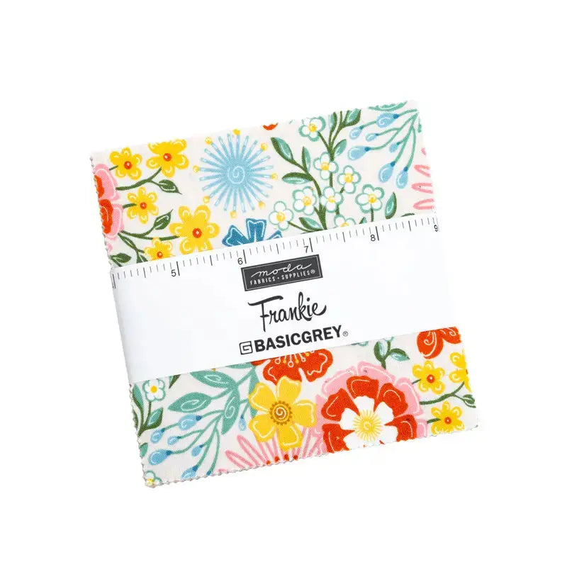 a packet of fabric charm squares for sewing