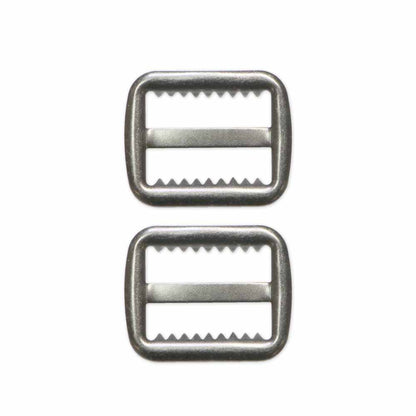 Two metal buckles on a white background