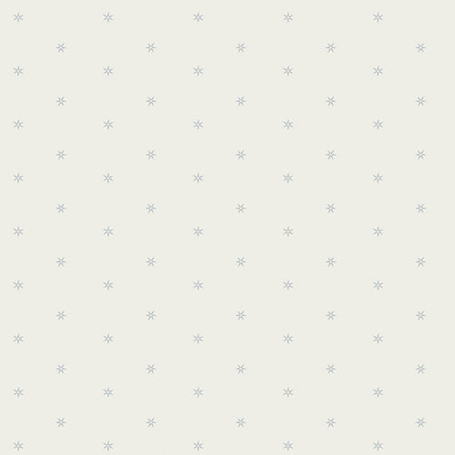 Pattern of small stars on a light gray background. From the fabric line Barcelona by Katarina Roccella for Art Gallery Fabrics.