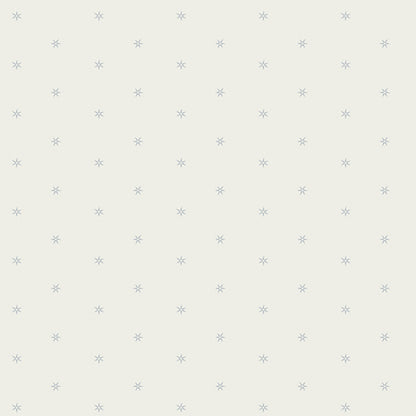 Pattern of small stars on a light gray background. From the fabric line Barcelona by Katarina Roccella for Art Gallery Fabrics.
