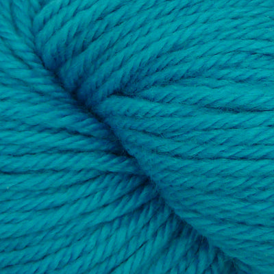 Close-up of blue yarn with a focus on texture and color.