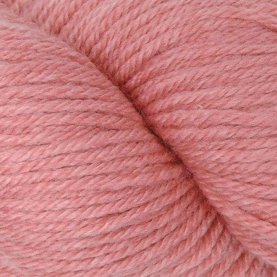 Close-up of pink yarn with a soft texture