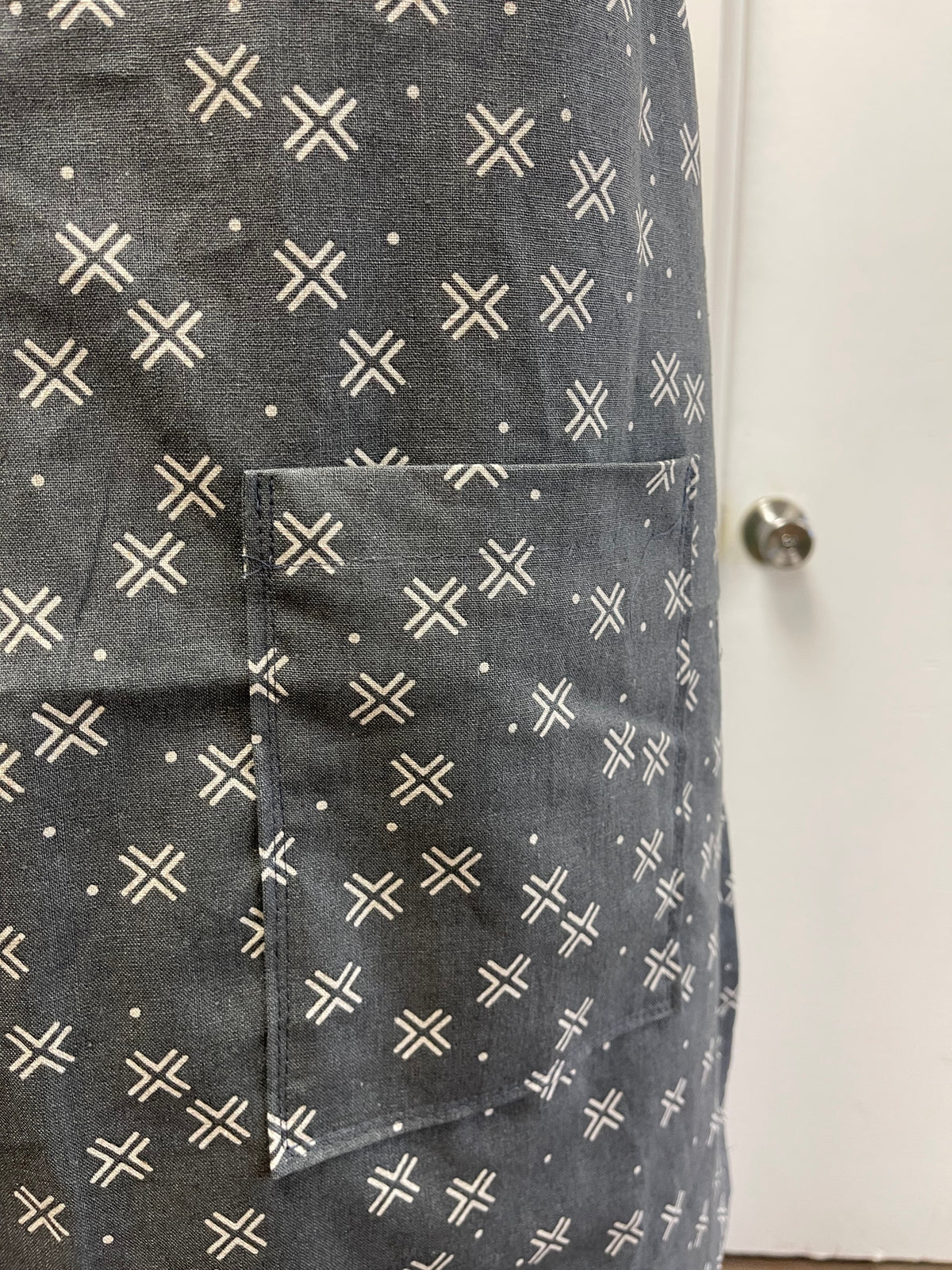 close up of a pocket on an apron for a sewing class