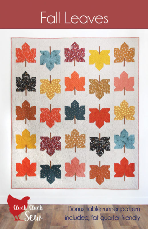 Quilt pattern with colorful leaf designs on a white background from Cluck Cluck Sew