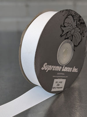 Spool of cream grosegrain ribbon for crafting and decorating 