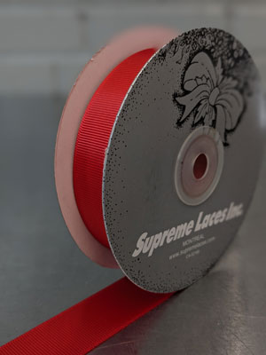 red grosgrain ribbon for sewing and crafting decorating.