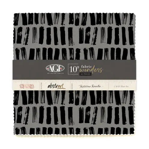 Fabric with a geometric pattern featuring shades of gray and black. Layer cake by Katarina Roccella for Art Gallery Fabrics.