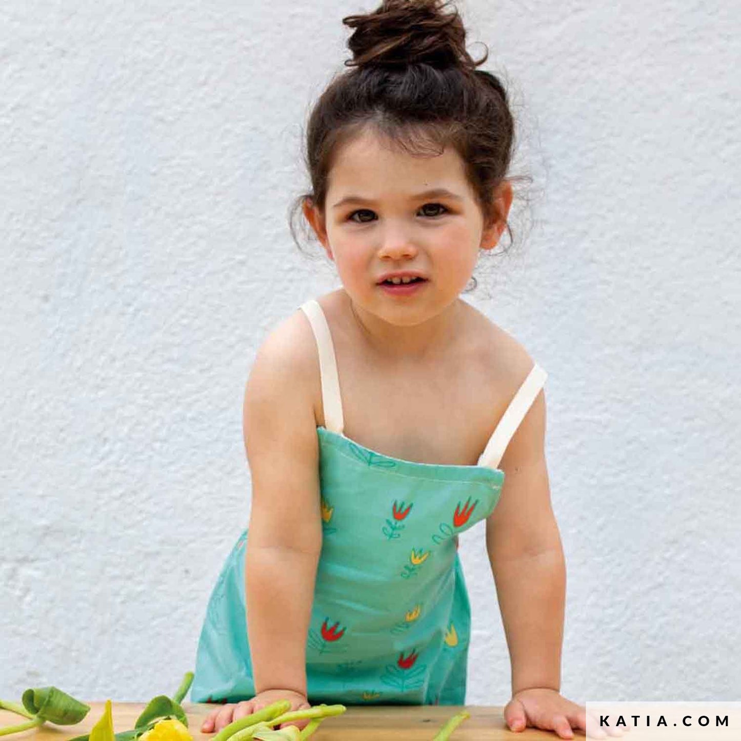 girl wearing dress with tulip design