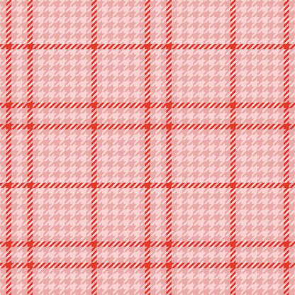 Fabric with plaid pattern with red lines on a pink background