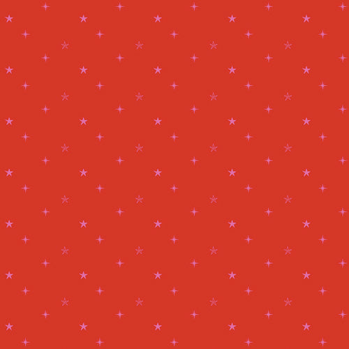 Fabric with red background with small pink stars