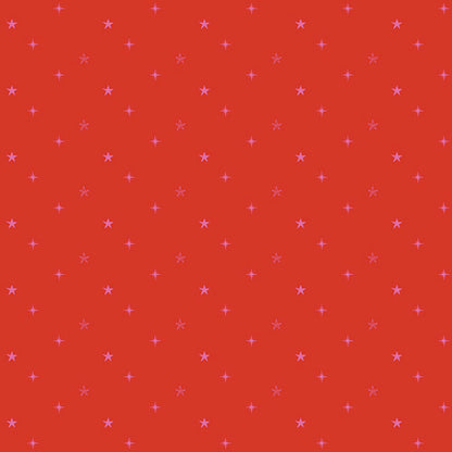 Fabric with red background with small pink stars