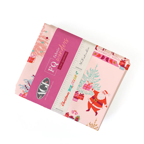 Pack of fat quarter fabric squares with Christmas design and ruler on a white background from Art Gallery Fabrics called Christmas in Color
