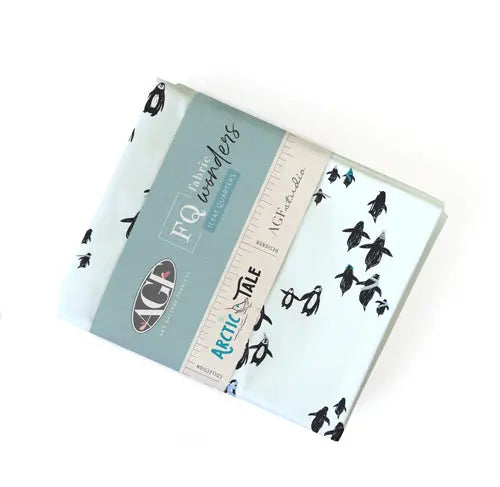 Art Gallery Fabric fat quarter bundle 10 pieces featuring various artic theme fabrics and animals.
