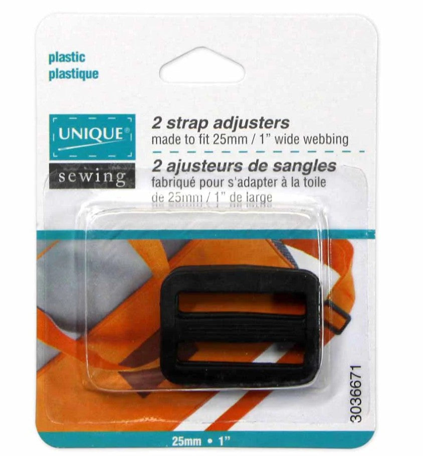 Packaging of 2 strap adjusters with a black strap on an orange and gray patterned background.