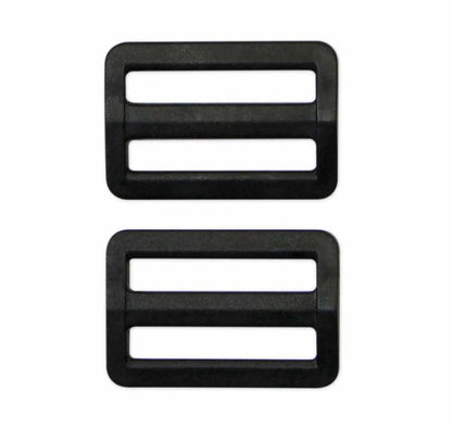 Two black plastic buckles on a white background