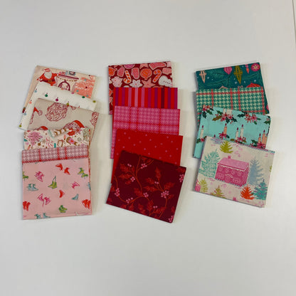 A set of twelve small fabric swatches with various holiday-themed patterns, including Christmas trees, flamingos, reindeer, and snowflakes, arranged on a plain white surface.