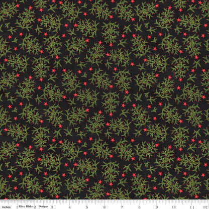 Fabric with green leaf pattern on a black background