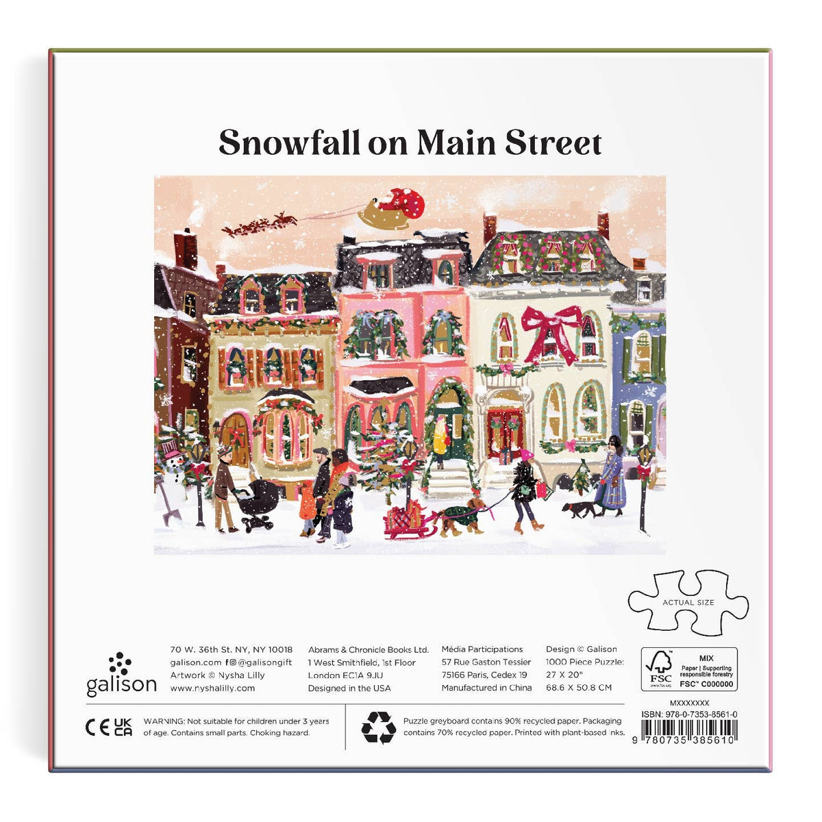 Puzzle box cover with a winter scene of a town and 'Snowfall on Main Street' text, featuring Galison branding.