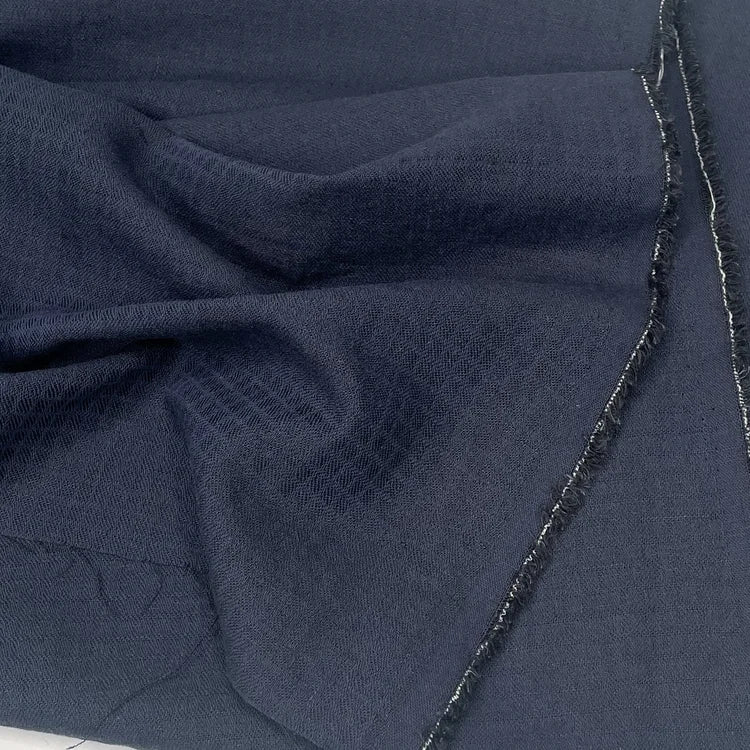 Black cotton linen fabric with subtle check pattern for sewing. 