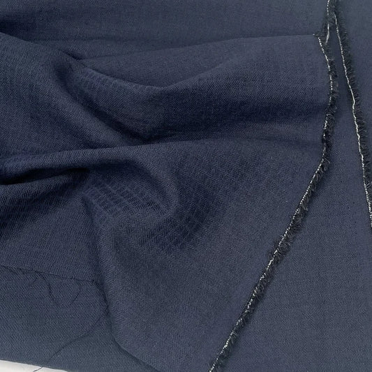 Black cotton linen fabric with subtle check pattern for sewing. 