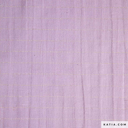Close up of cotton fabric for sewing garments in lilac with a gold stripe