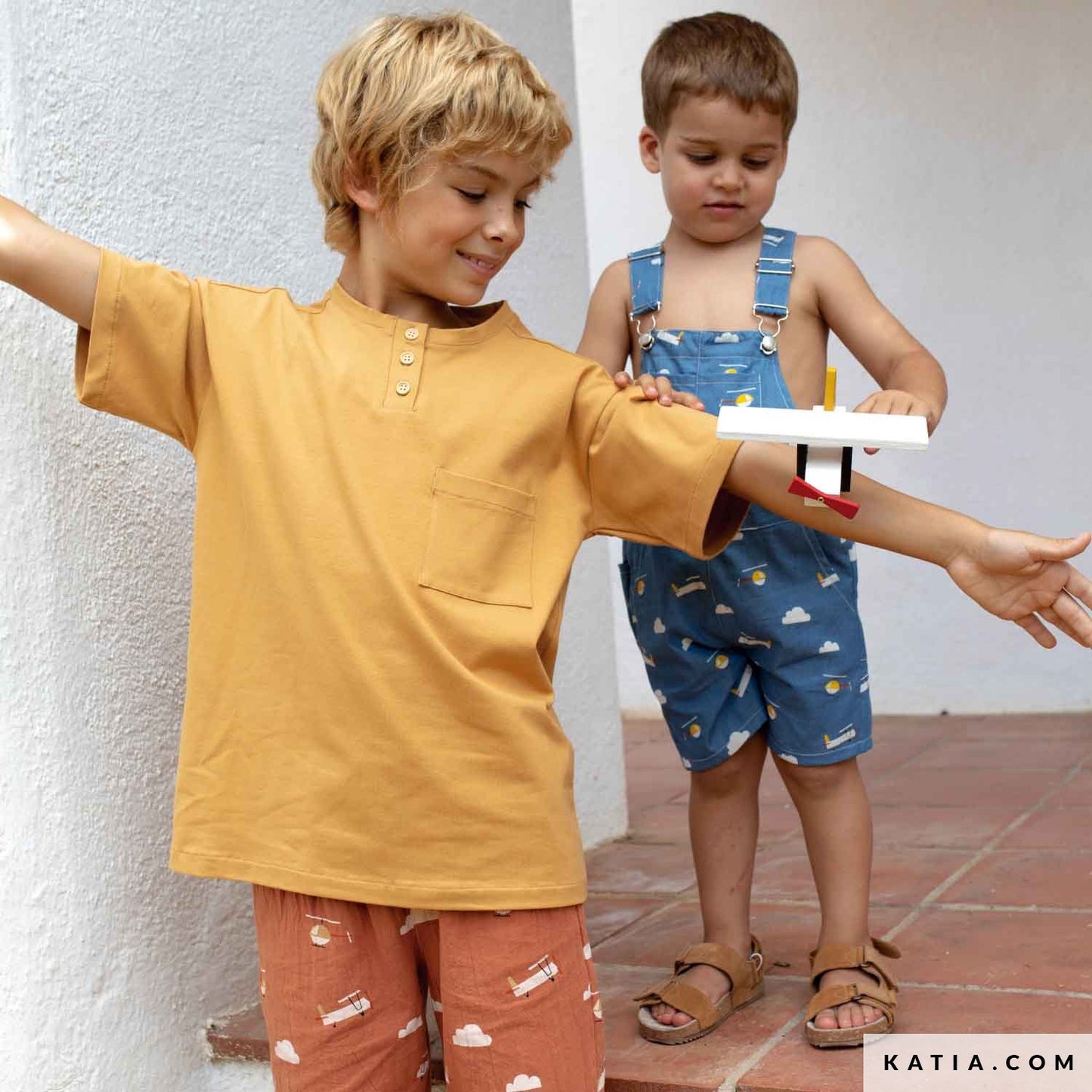Children playing in clothing made with rustic cotton fabric 