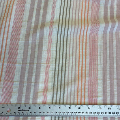 Striped fabric with a ruler at the bottom for scale