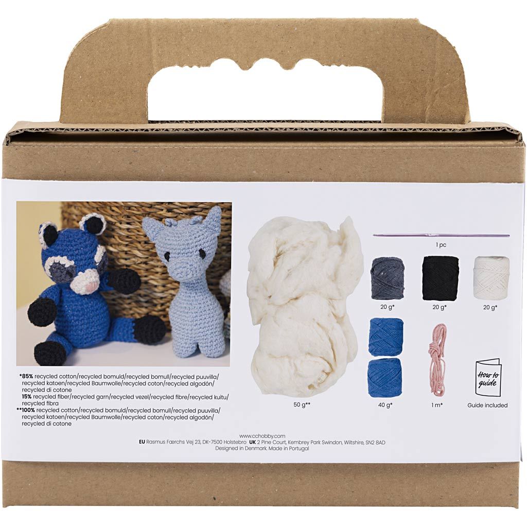 contents of a raccoon crochet kit