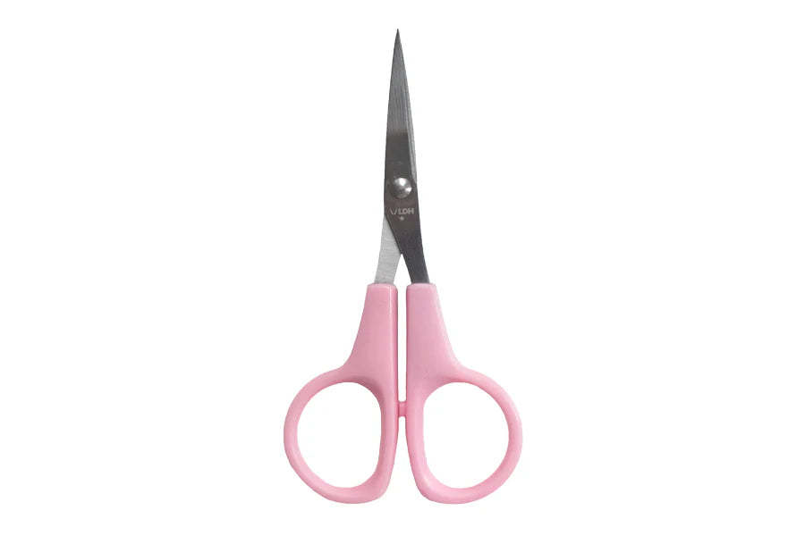 Pink scissors with silver blades on a white background