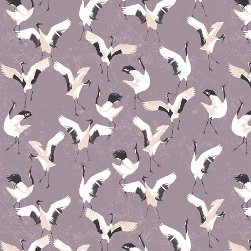 Patterned fabric of white cranes with black heads on a purple background from Soar by Katerina Roccella Art Gallery Fabrics premium cotton for sewing and crafting.