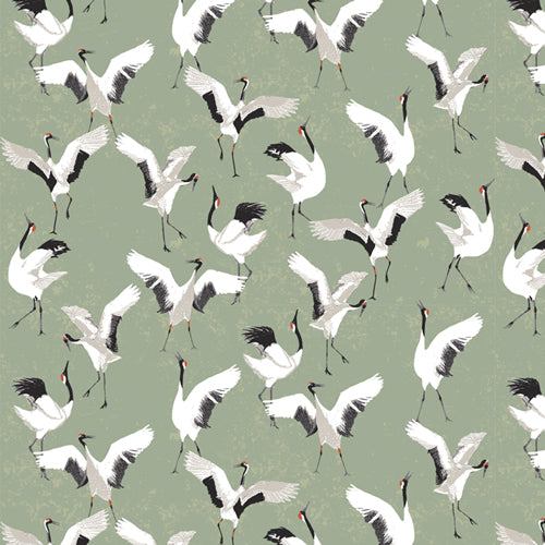 Patterned fabric of white cranes with black legs and necks on a green background from Soar by Katerina Roccella Art Gallery Fabrics premium cotton for sewing and crafting.
