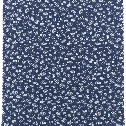 blue fabric with small white floral pattern