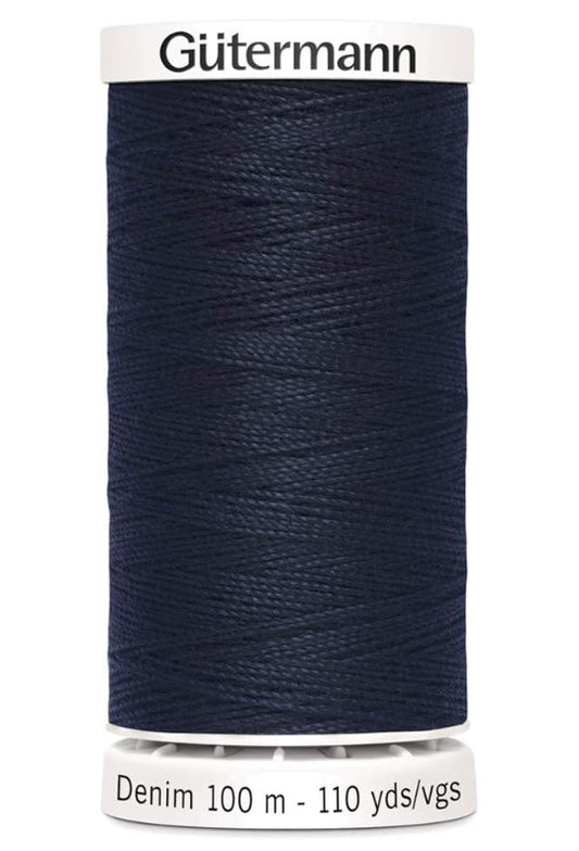 Spool of Gutermann denim thread on a white background