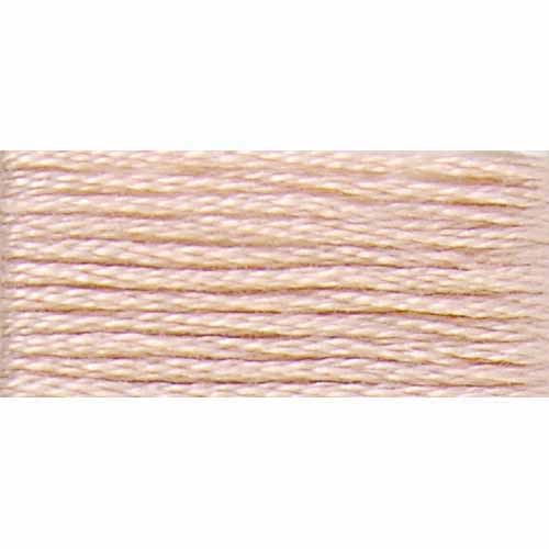 Close-up of beige thread on a white background