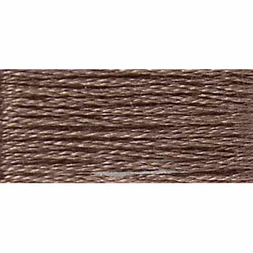 Close-up of brown embroidery thread on a white background