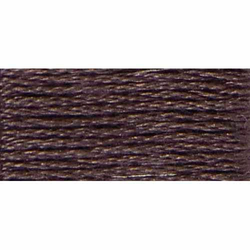 Close-up of brown embroidery thread on a white background