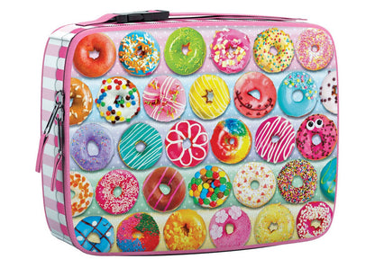 Colorful donut-patterned lunch bag containing a puzzle with a pink checkered strap on a white background