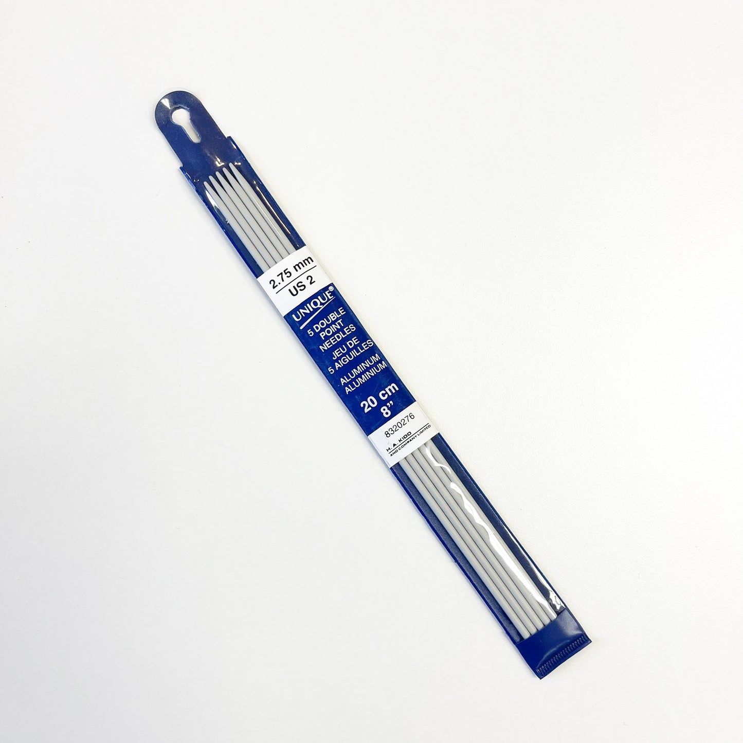 A pack of 5 Unique 2.75 mm knitting, 20 cm length, in a blue and white plastic blister pack with a hanger tab.