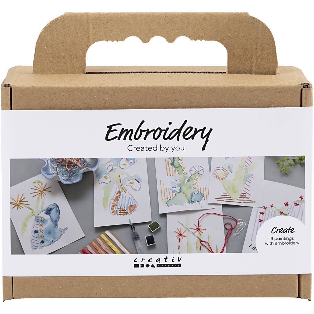 Embroidery kit packaging with illustrations and 'creativ' branding on a white background