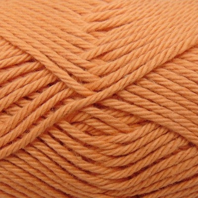 Close-up of a ball of orange yarn