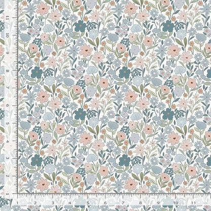 Floral patterned fabric with a ruler for scale on a white background