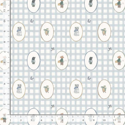 Fabric with teddy bear pattern on a checkered background, measured with a ruler.