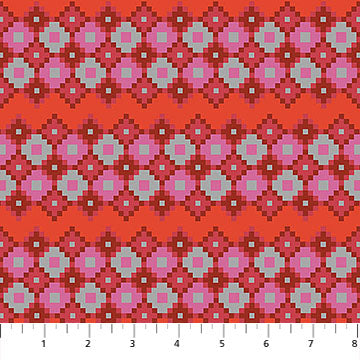 Patterned fabric with pink and red design on a red background