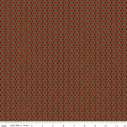 Patterned fabric with red and green design on a brown background